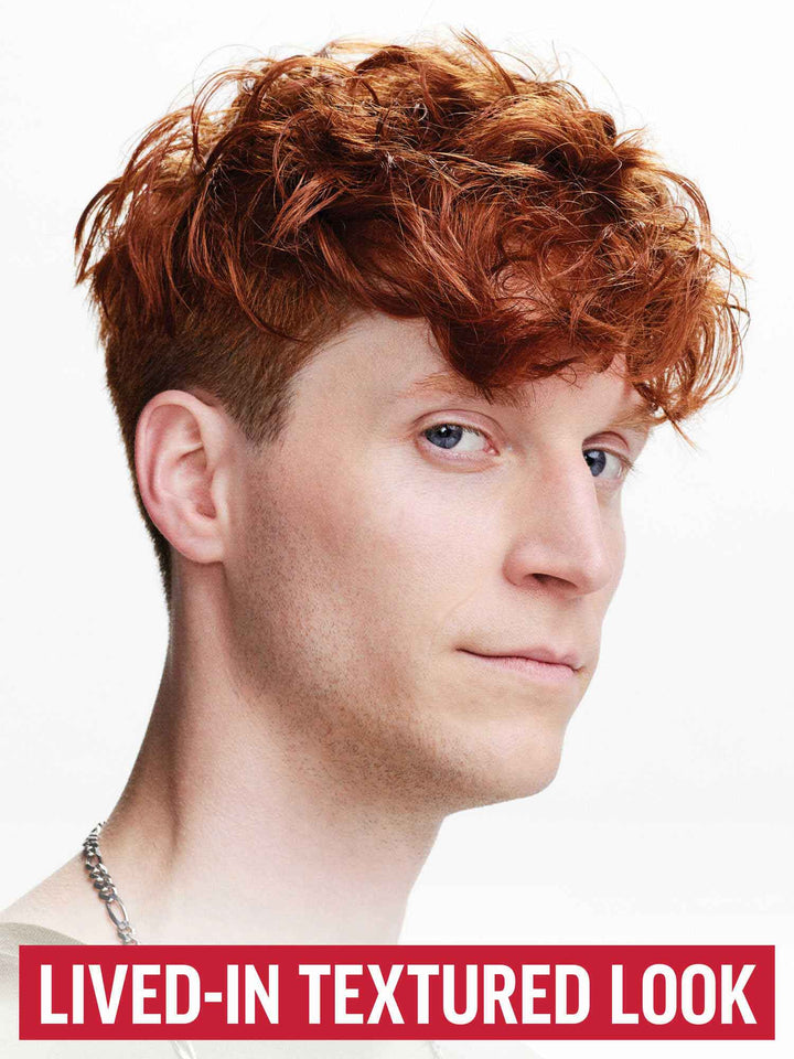 Cream Pomade Styling Puck on model showing lived-in textured look